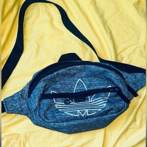 Adidas blue Gray Waist Bag $10 looks like new
*A few pen spots inside last pic